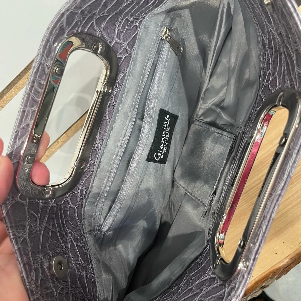 Giannini faux leather clutch